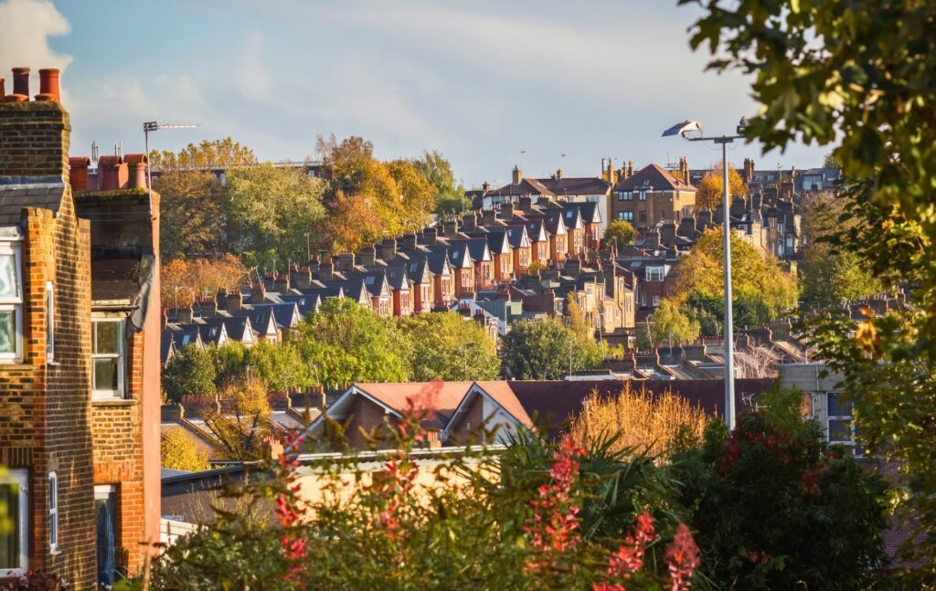 Long row of terraced houses on the hillside in Crouch End