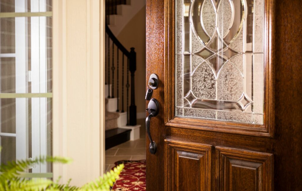Opening door to modern family home