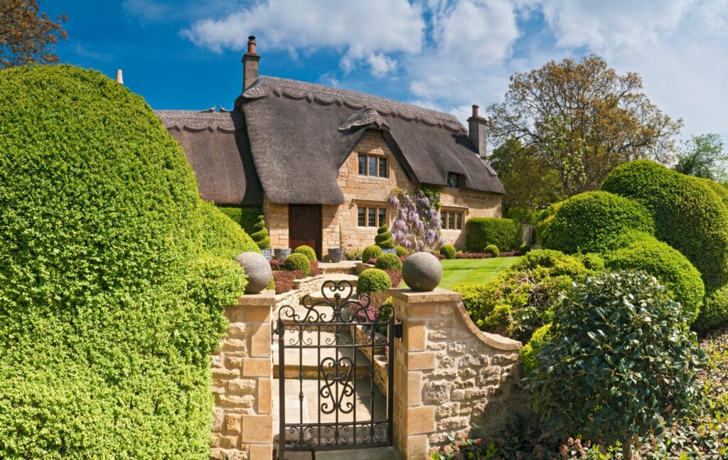 Idyllic cottage representing buying a holiday home for family use in the UK